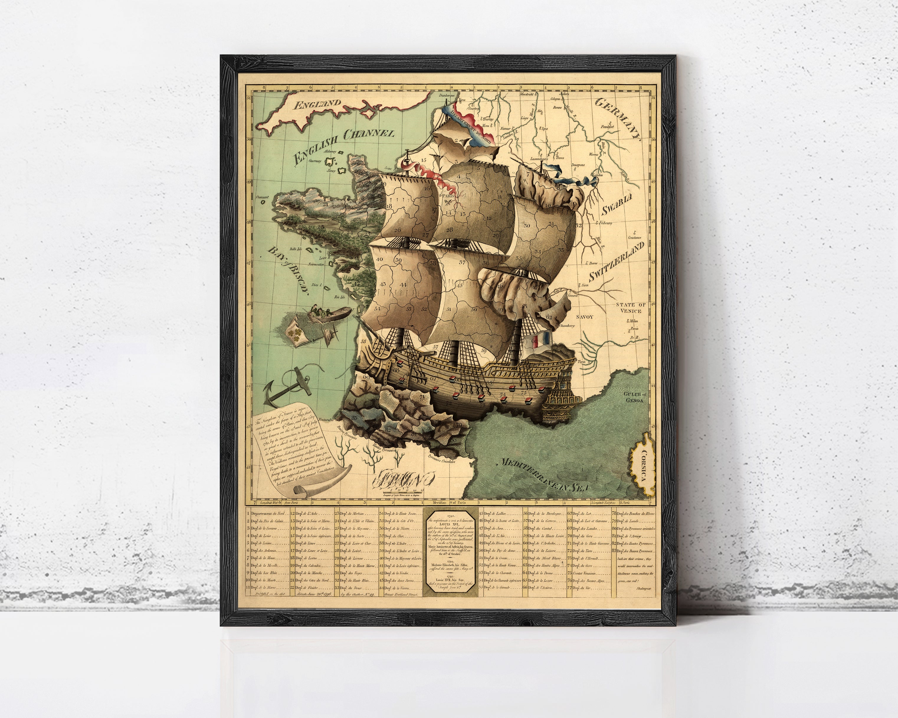 The image is a framed vintage map depicting a sailing ship on the ocean, with various geographical and nautical elements.