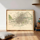 a large framed map of Dublin, Ireland, displayed on a wooden floor.