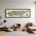 A framed map of New York City, depicting the city's streets and neighborhoods, is displayed against a white wall.