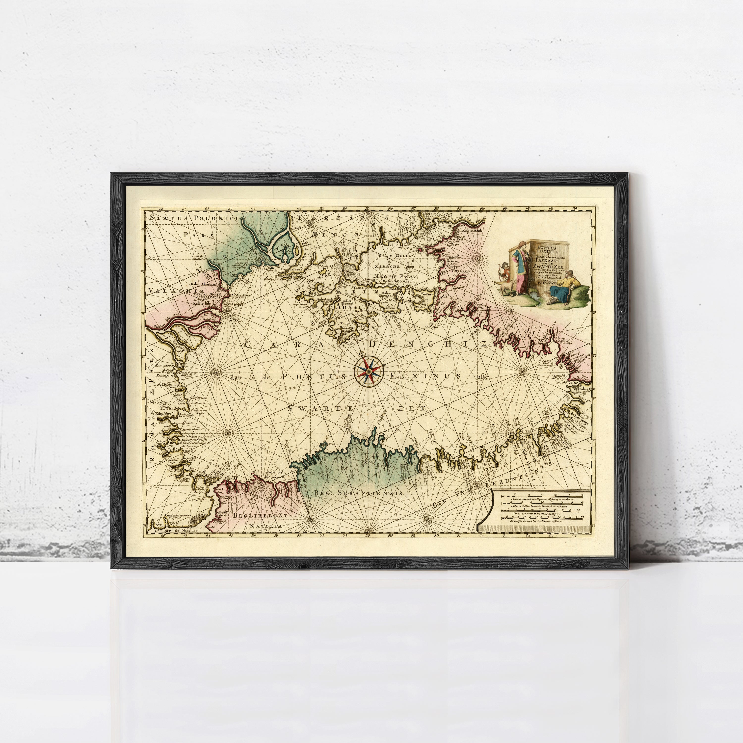 The image is a framed map of the world, depicting a detailed and intricate map with various geographical features and labels.