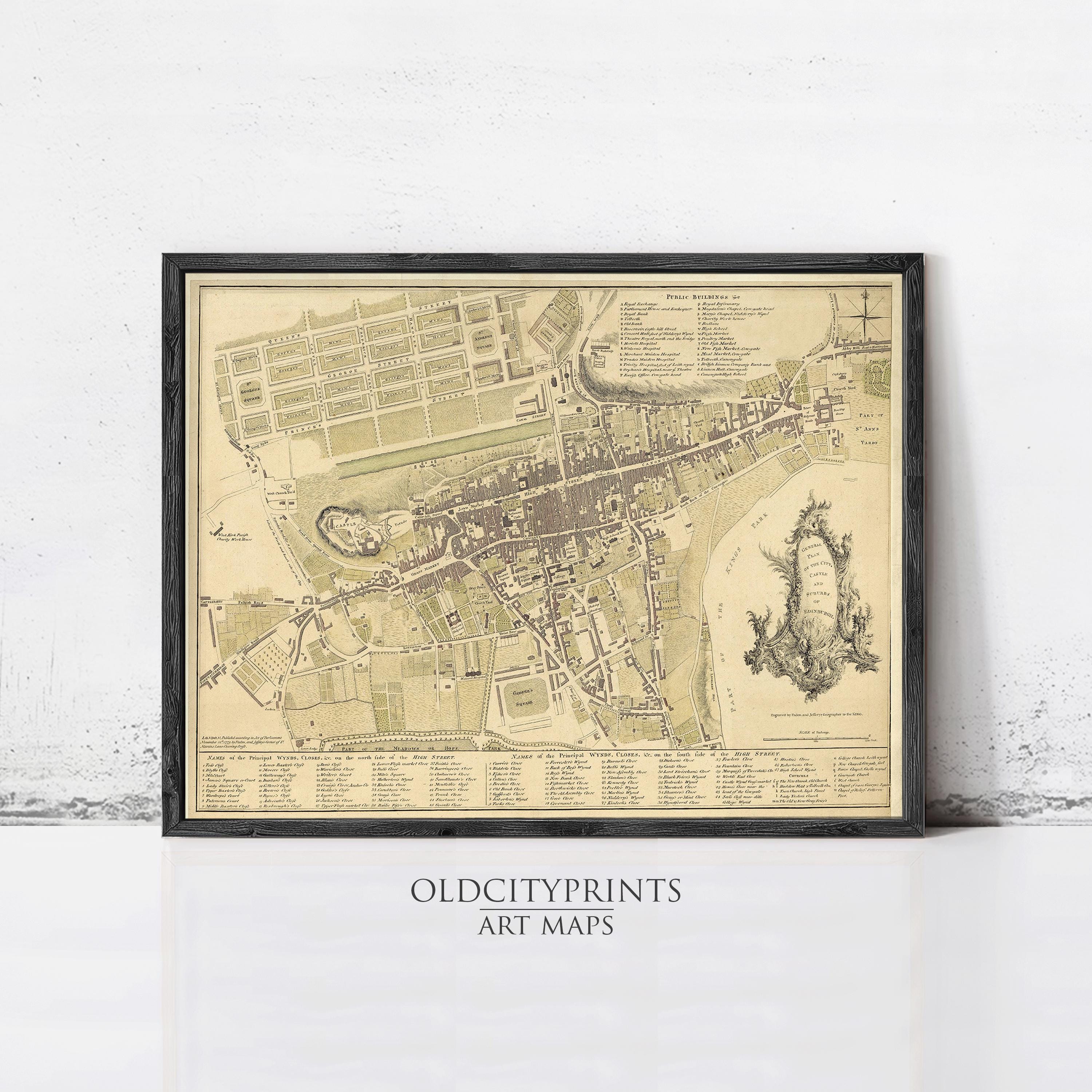 The image is a framed vintage map of a city, likely from the 17th century, with detailed cartography and a historical context.