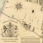 The image is a historical map showing a street layout with buildings, roads, and a river.