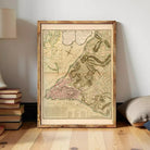 The image is a framed historical map of the city of New York, depicting the city's layout and surrounding areas.