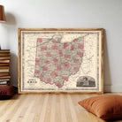 The image is a framed map of Ohio, featuring a vintage style with a red and green color scheme.