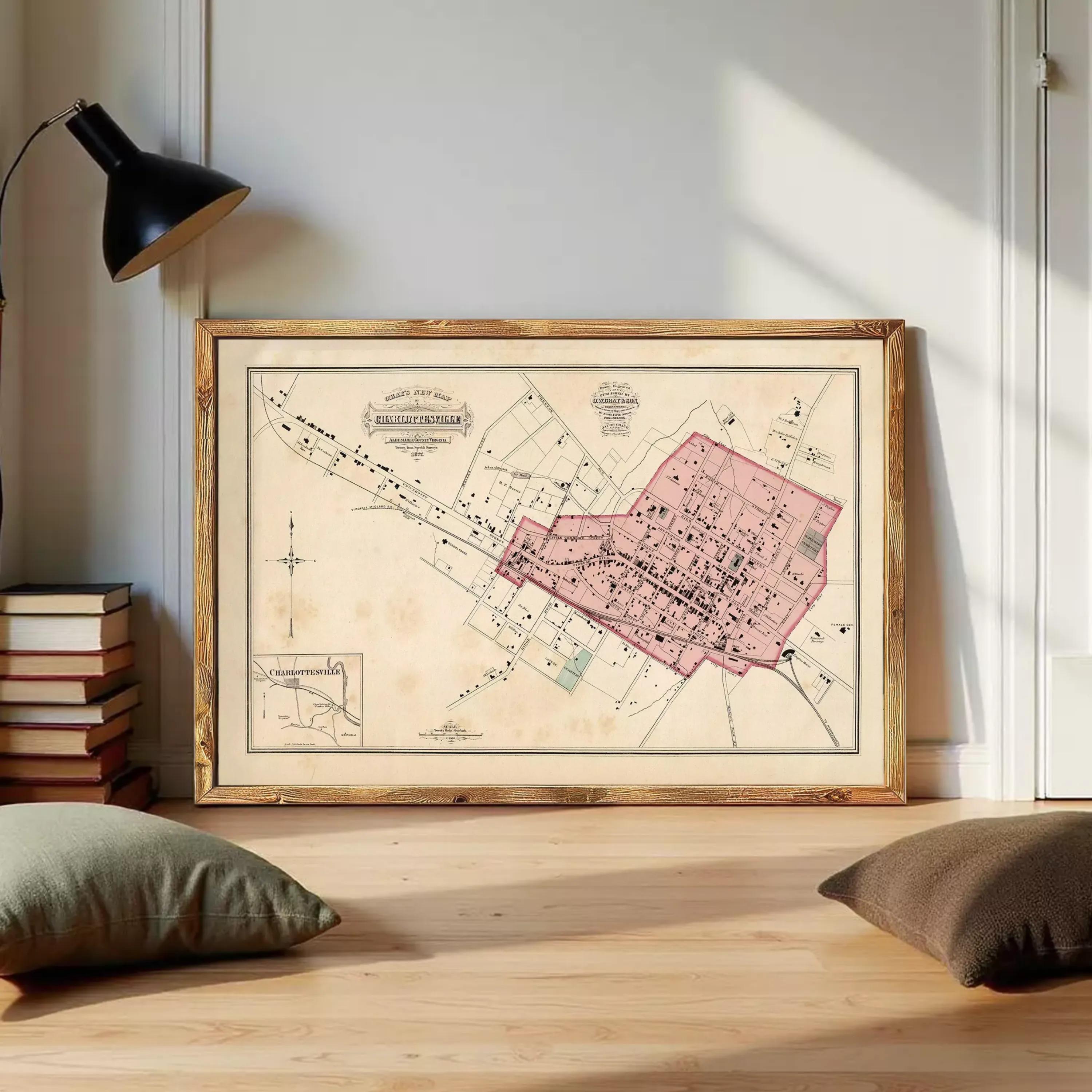 The image is a framed vintage map of a city, depicting a detailed layout of streets, buildings, and other urban features.