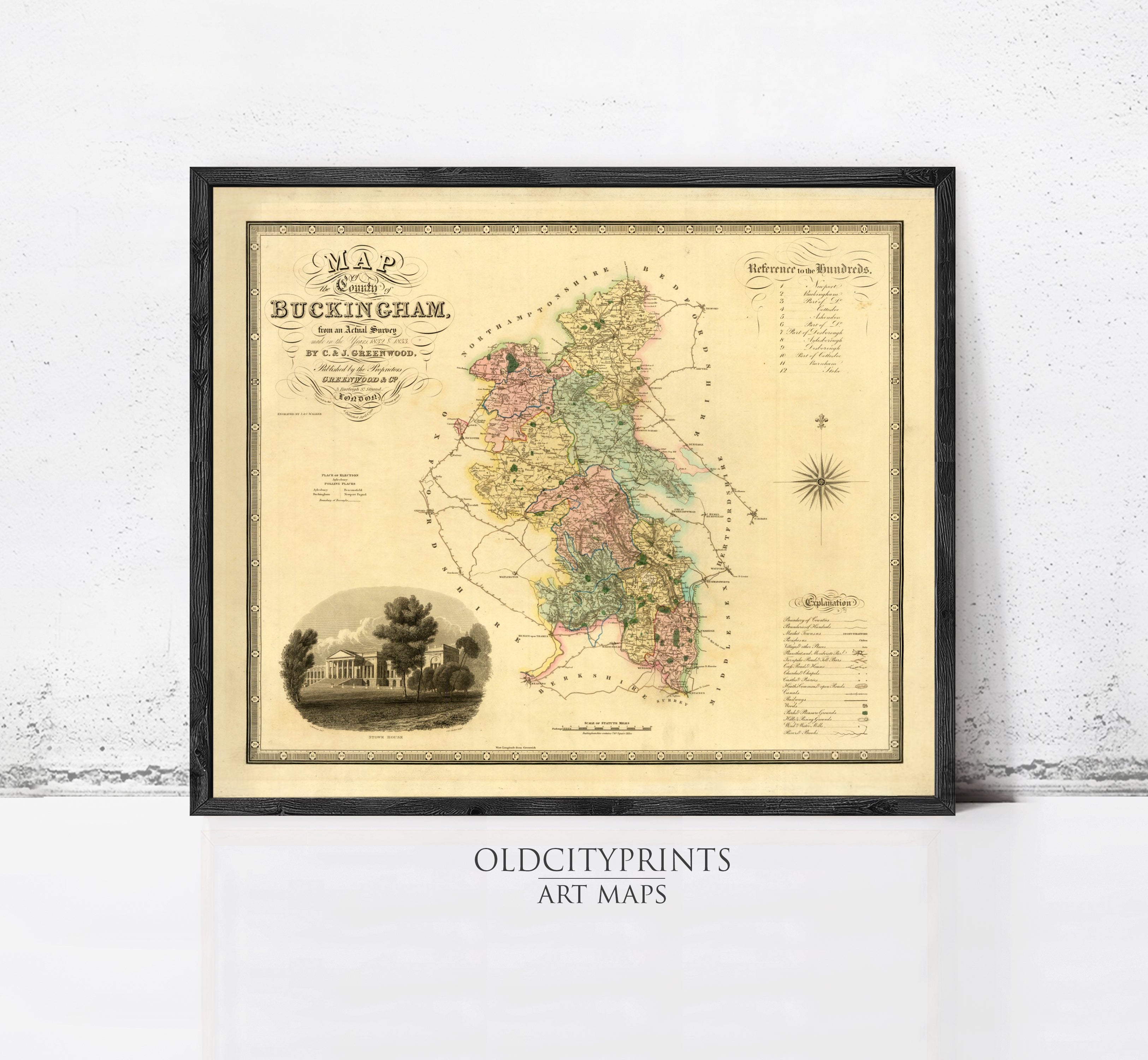 The image is a framed antique map of Buckingham, England, depicting a detailed and colorful representation of the region.