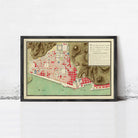 The image is a framed map of a city, depicting the layout and various landmarks.