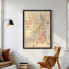 The image is a framed vintage map of Boston, Massachusetts, with a black border and a beige background.