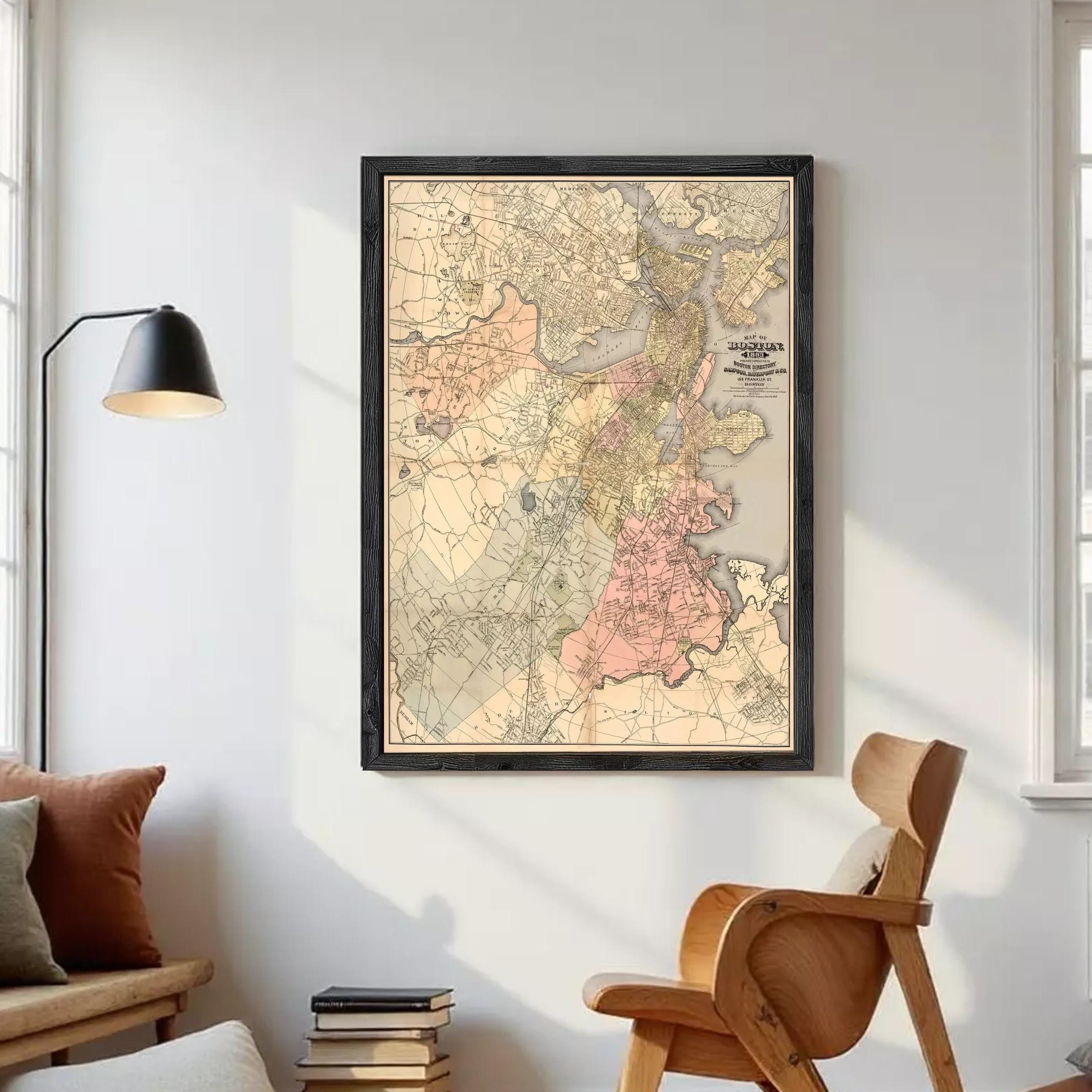 The image is a framed vintage map of Boston, Massachusetts, with a black border and a beige background.