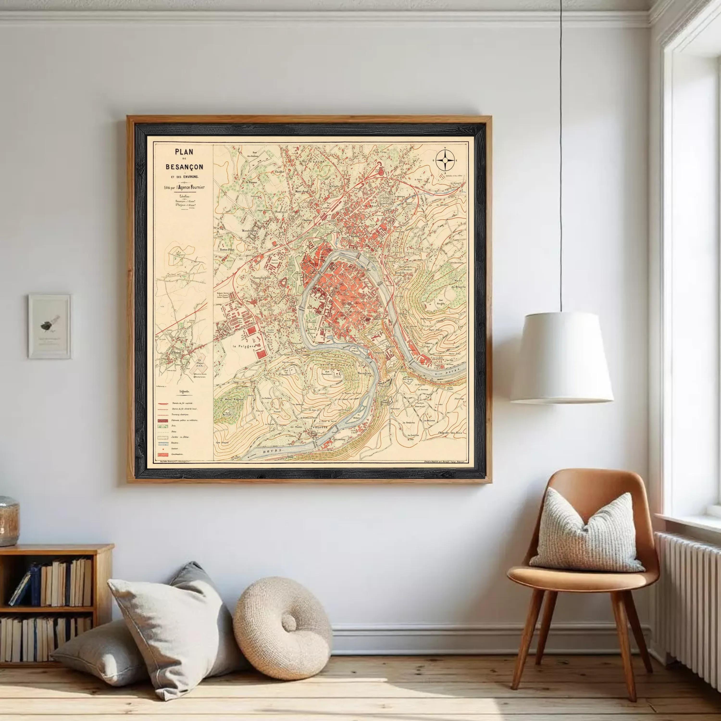 The image is a framed vintage map of the city of Besancon, showing various landmarks and geographical features.