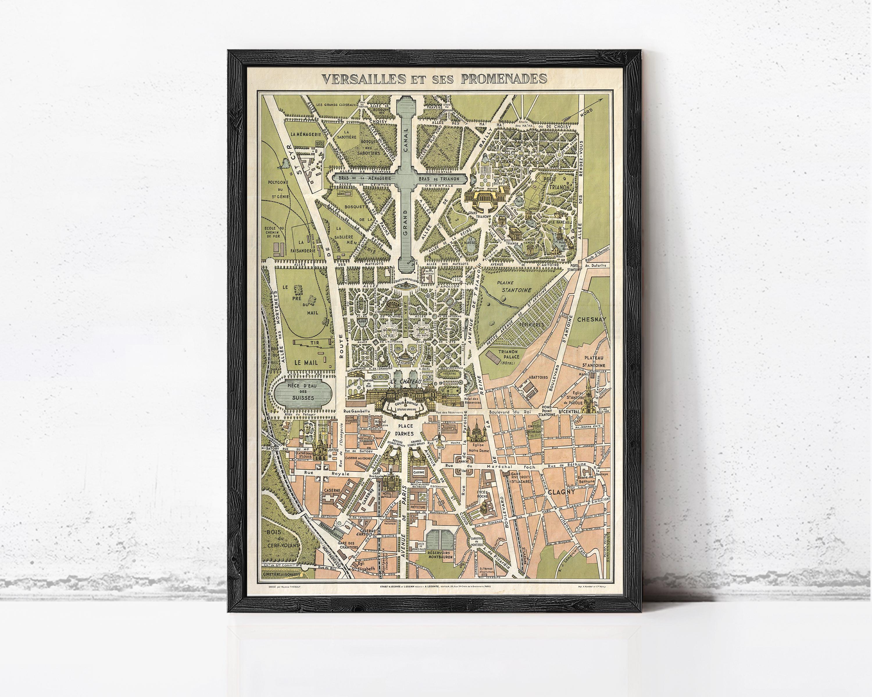 The image is a framed vintage map of Paris, France, depicting the city's layout and landmarks.