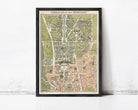 The image is a framed vintage map of Paris, France, depicting the city's layout and landmarks.