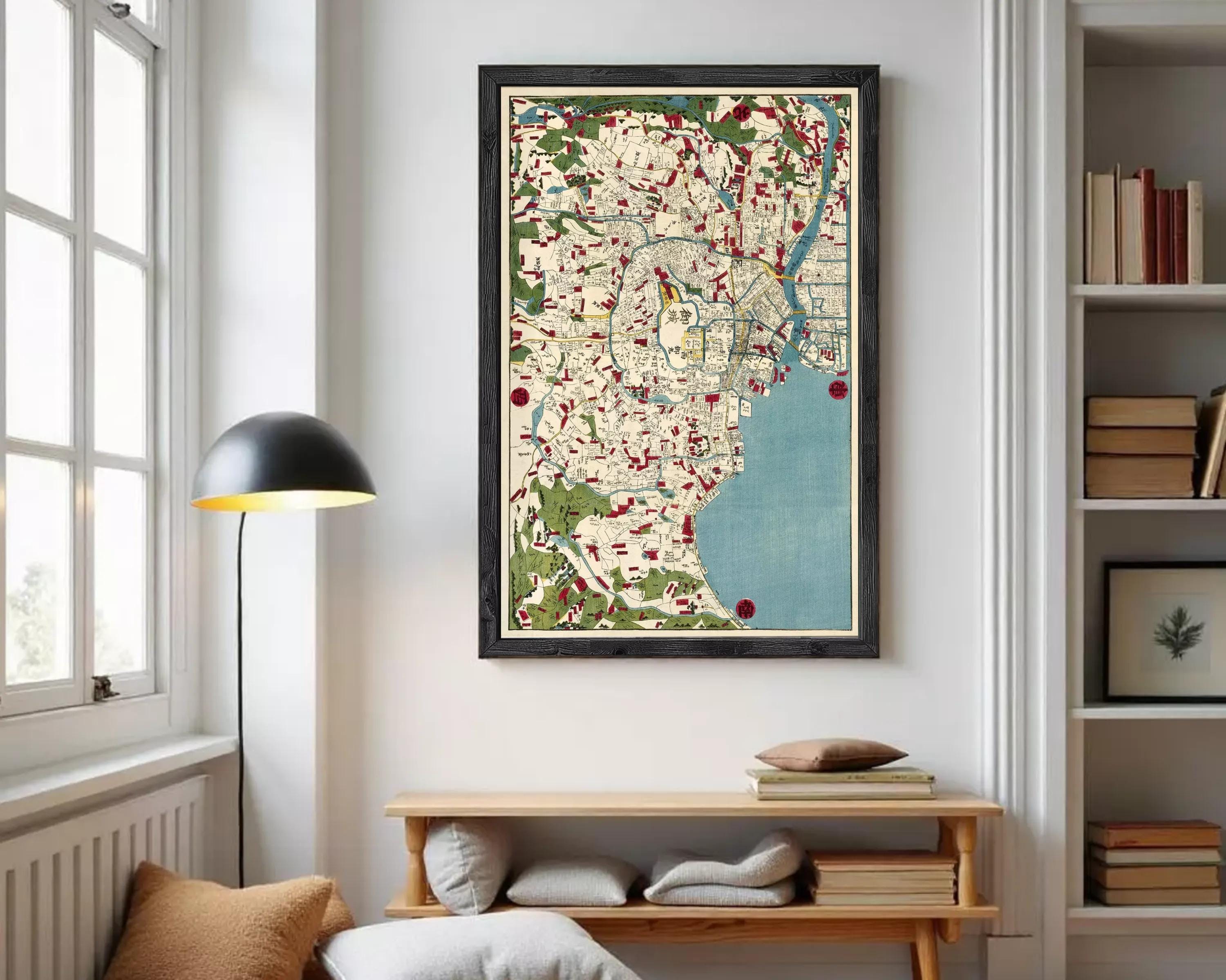 The image is a framed vintage map of a city, featuring a detailed and colorful depiction of the urban landscape.