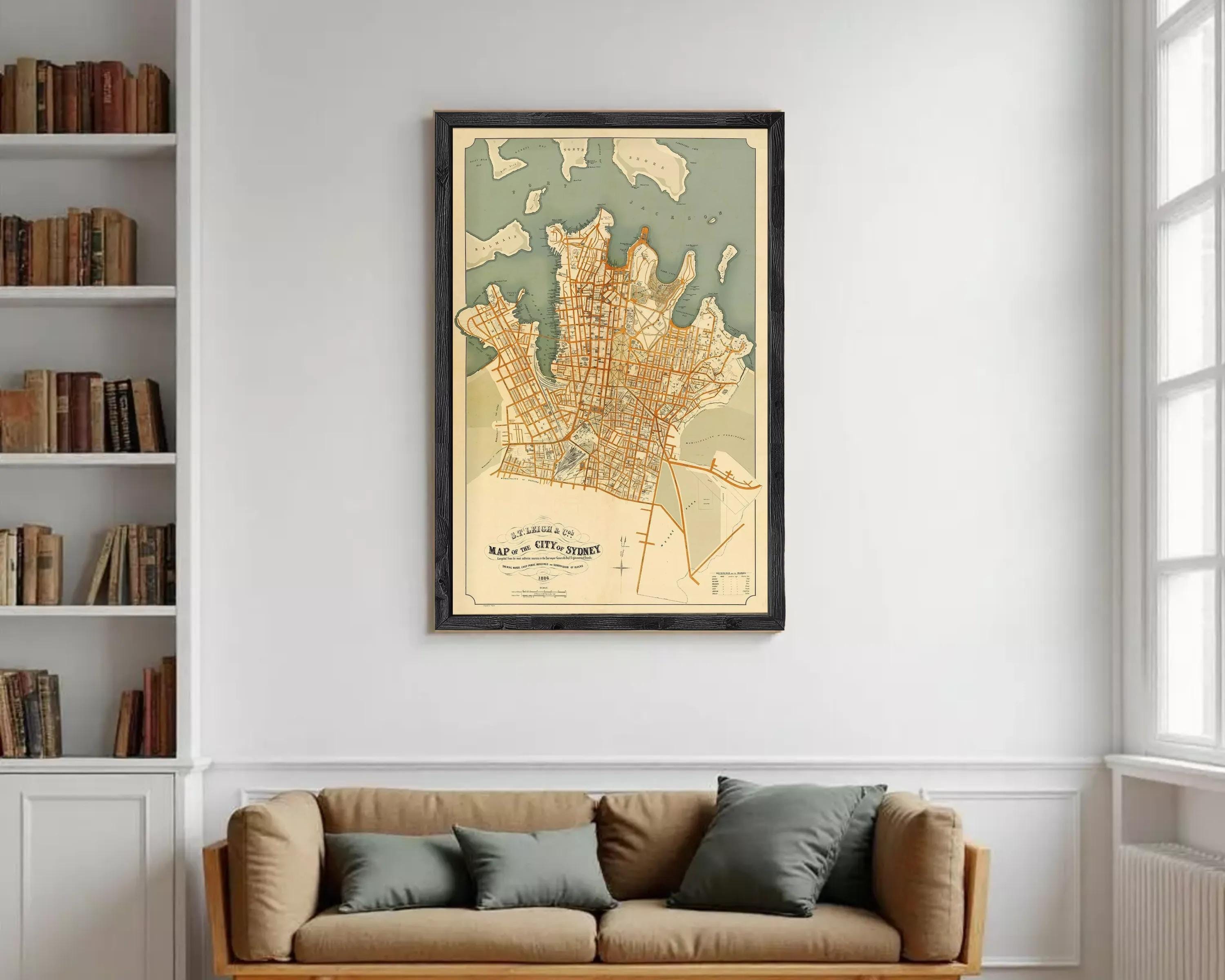 The image is a framed vintage map of Sydney, Australia, depicting the city's streets and surrounding areas.