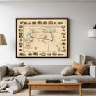 a large framed map hanging on a wall above a gray couch in a living room setting.