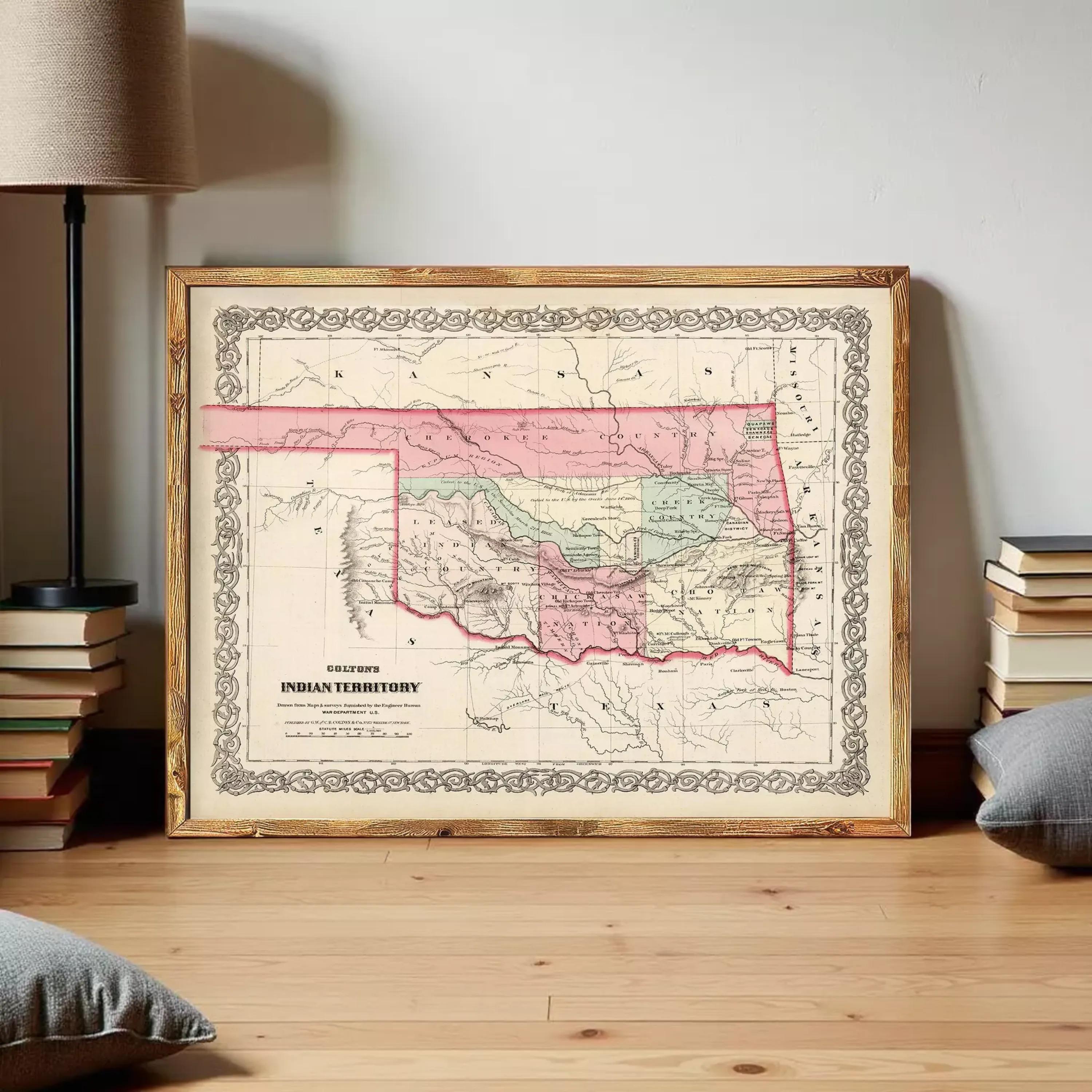 a framed map of Oklahoma, with a wooden frame and a decorative border.