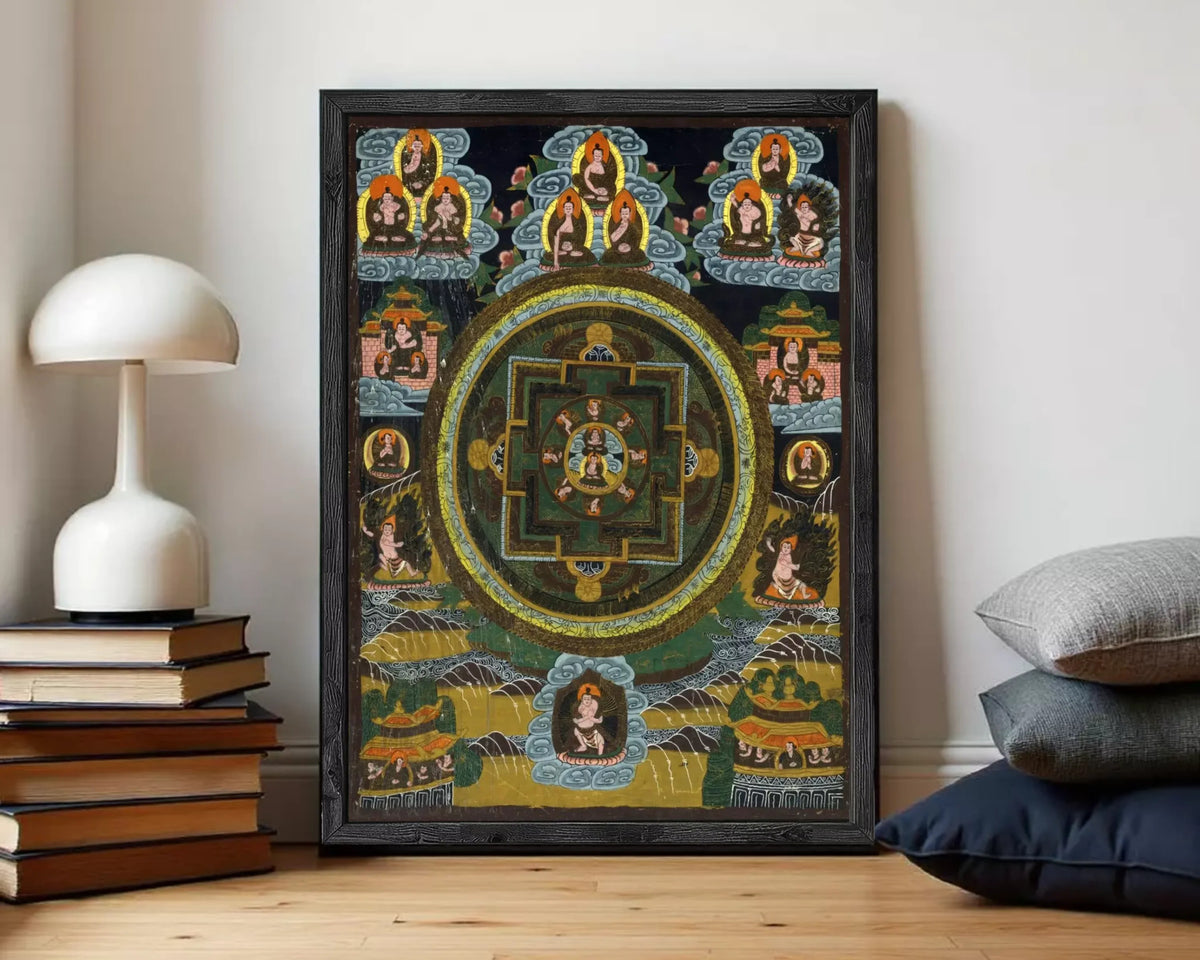 The image is a framed painting depicting a mandala with various figures and symbols surrounding it.