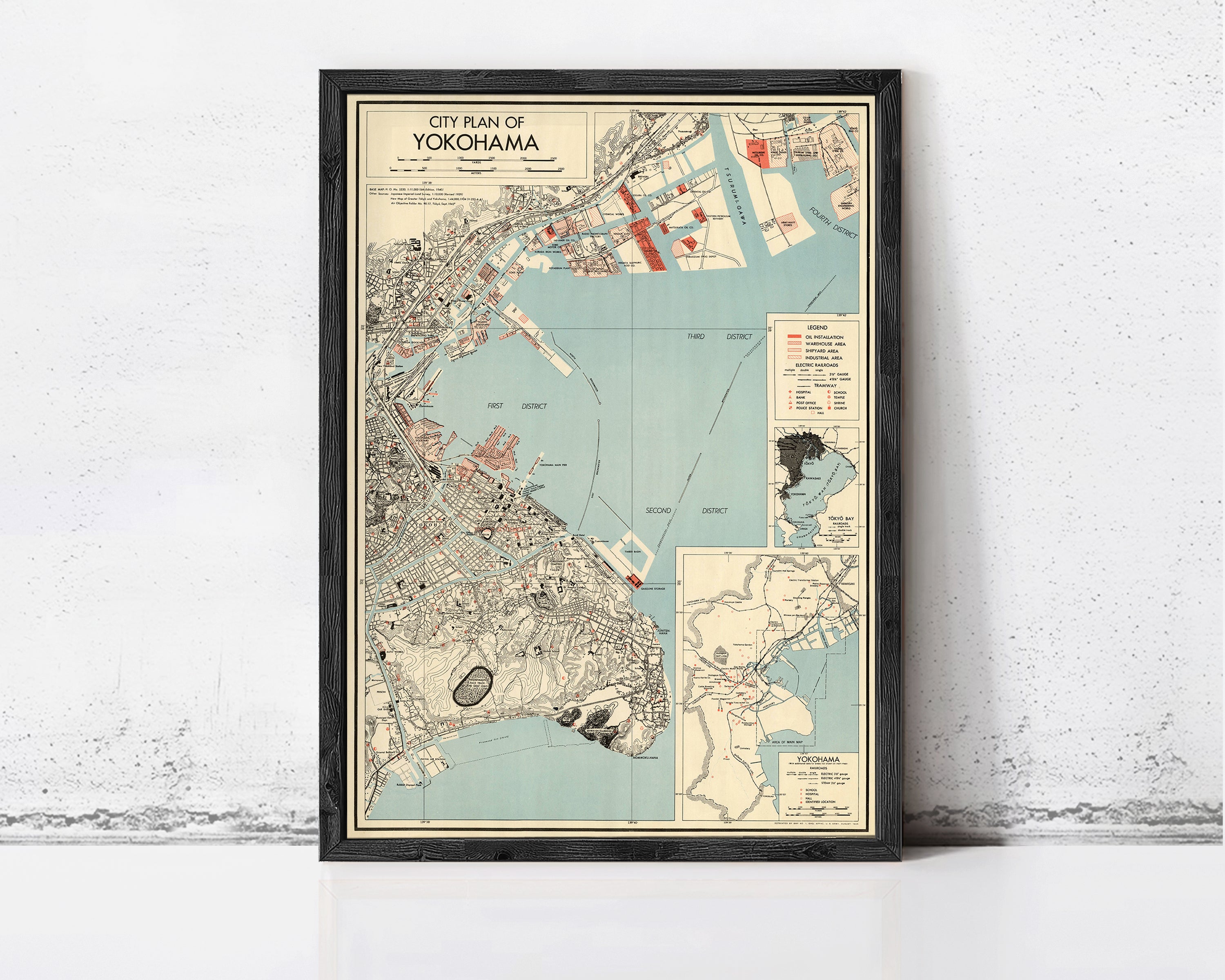 The image is a framed vintage map of the city of Yokohama, Japan, depicting the city's layout and surrounding areas.