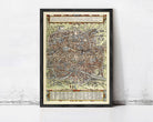 The image is a framed vintage map of a city, likely Paris, with intricate details and a detailed layout.