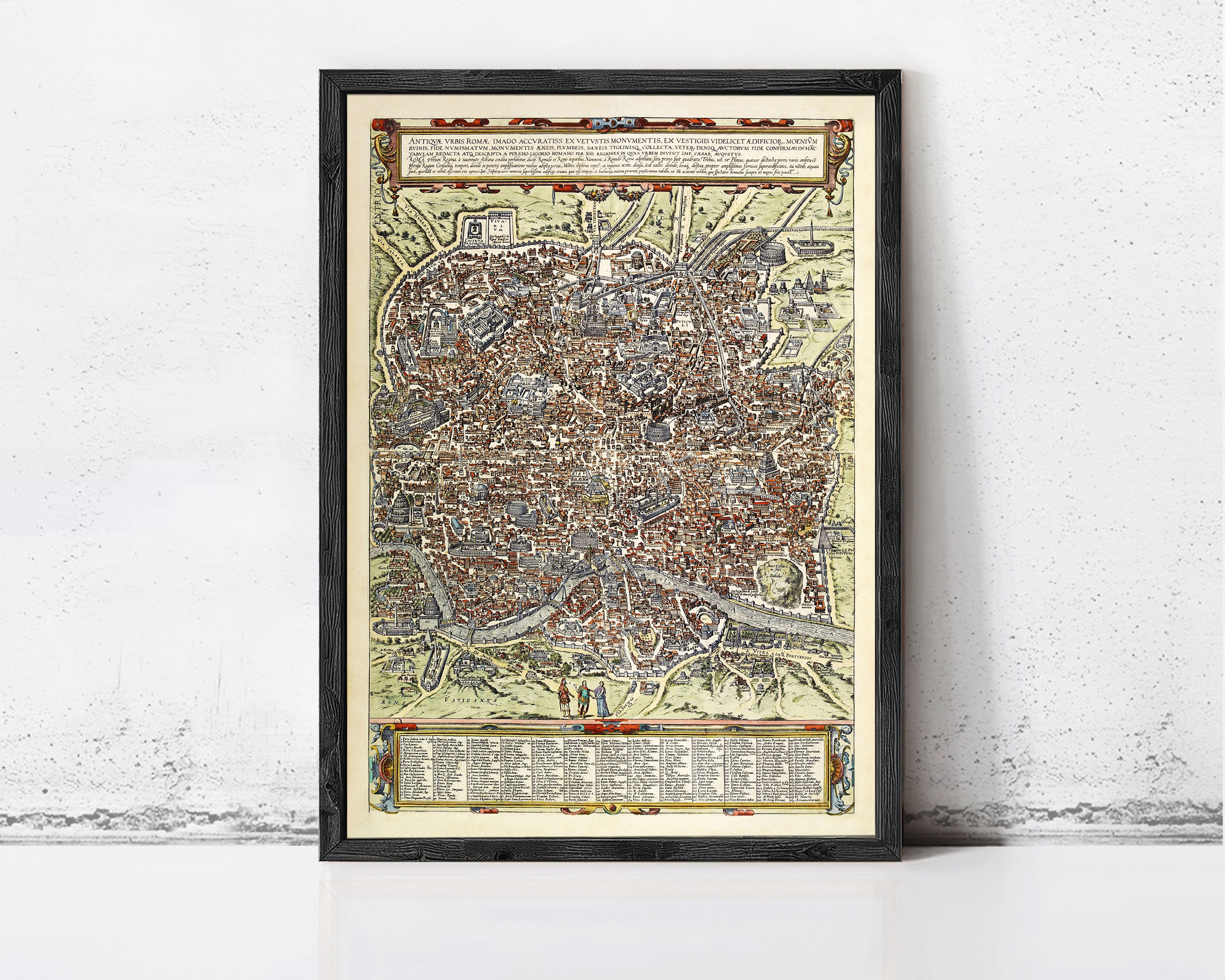 The image is a framed vintage map of a city, likely Paris, with intricate details and a detailed layout.
