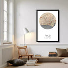 A framed map of Nice, France, with a circular design and a black border.