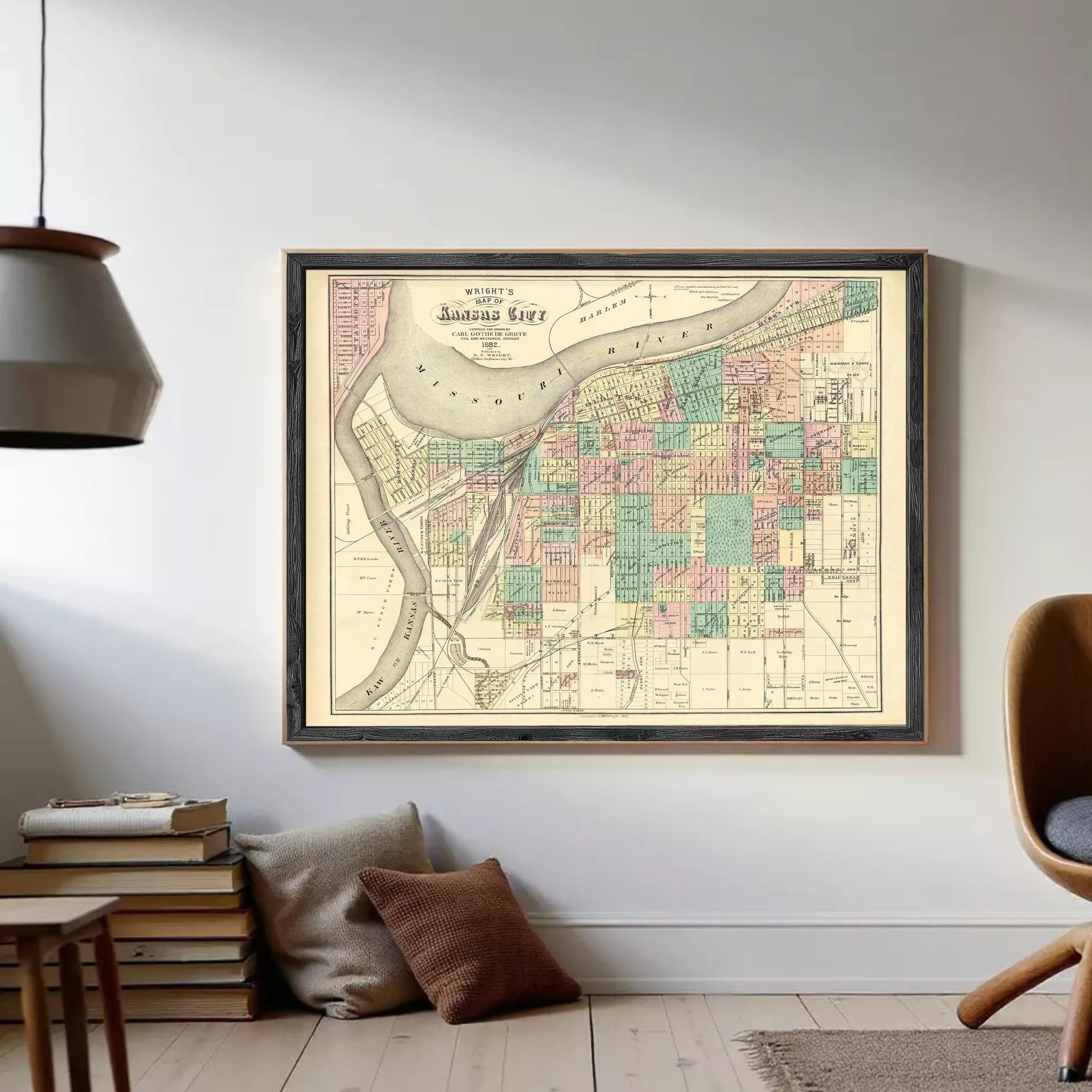 The image is a framed vintage map of the Kansas City area, depicting the city's layout and surrounding regions.