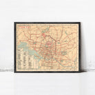 The image is a framed vintage map of Tokyo, Japan, depicting the city's streets and landmarks.