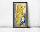 The image is a framed vintage map of South America, featuring various countries and regions with labels and illustrations.