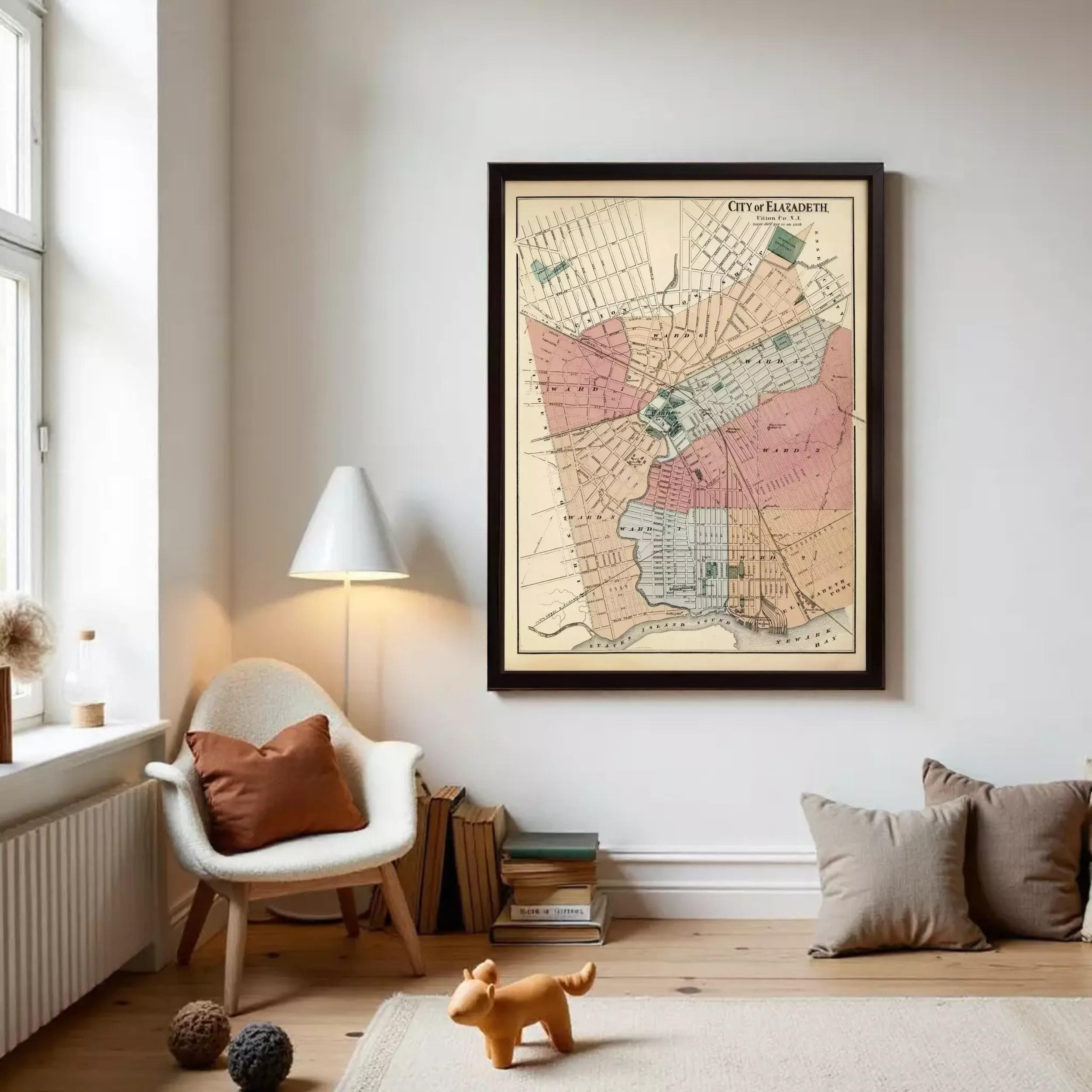 a living room with a large framed map of the city of El Salvador hanging on the wall. The room has a white chair, a lamp, and some books on a shelf. There is also a small dog figurine on the floor.