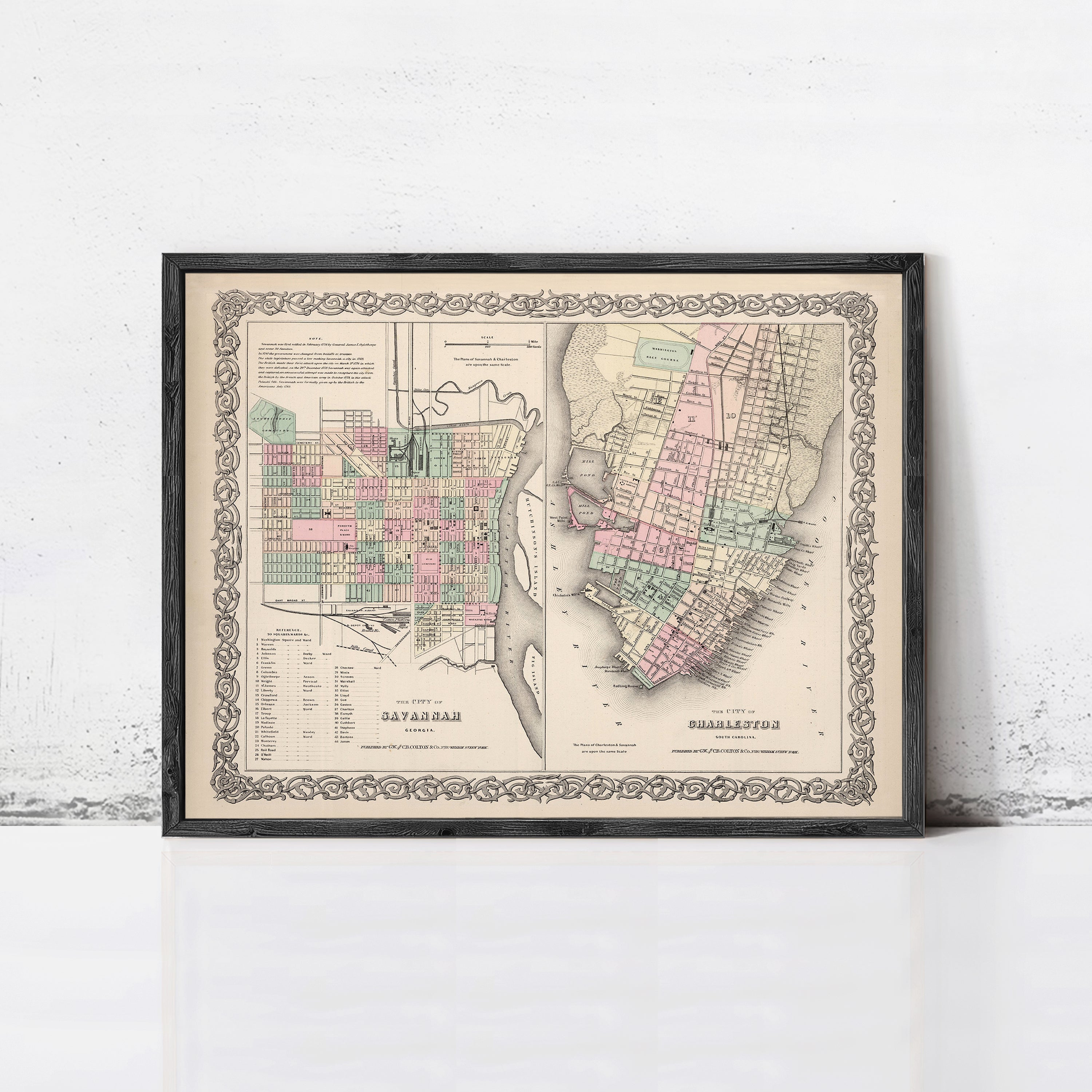 The image is a framed vintage map of the city of Savannah, Georgia, with a detailed layout of the city's streets and neighborhoods.