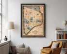 The image is a framed vintage map of New York City, depicting the city's streets and neighborhoods in a detailed and intricate manner.