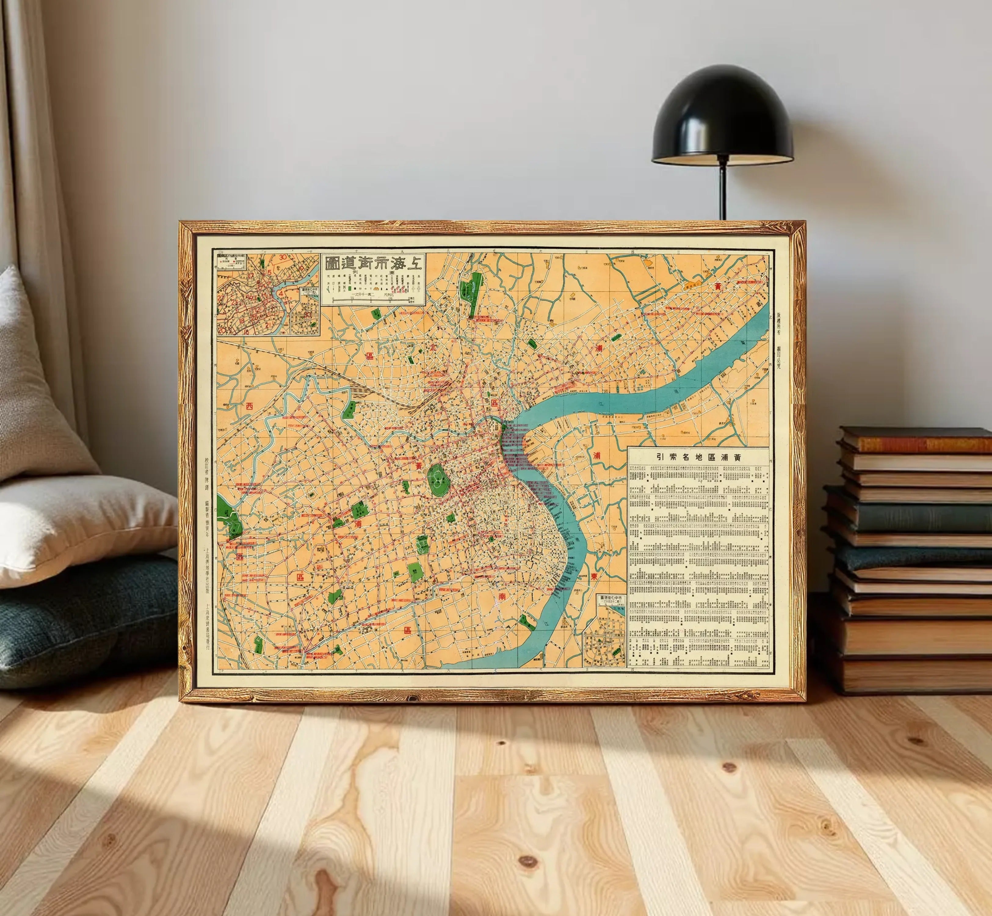 The image is a framed vintage map of a city, likely from the early 20th century, with a focus on the urban layout and transportation routes.