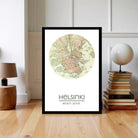 A framed map of Helsinki, Finland, with the city's name displayed below the map.