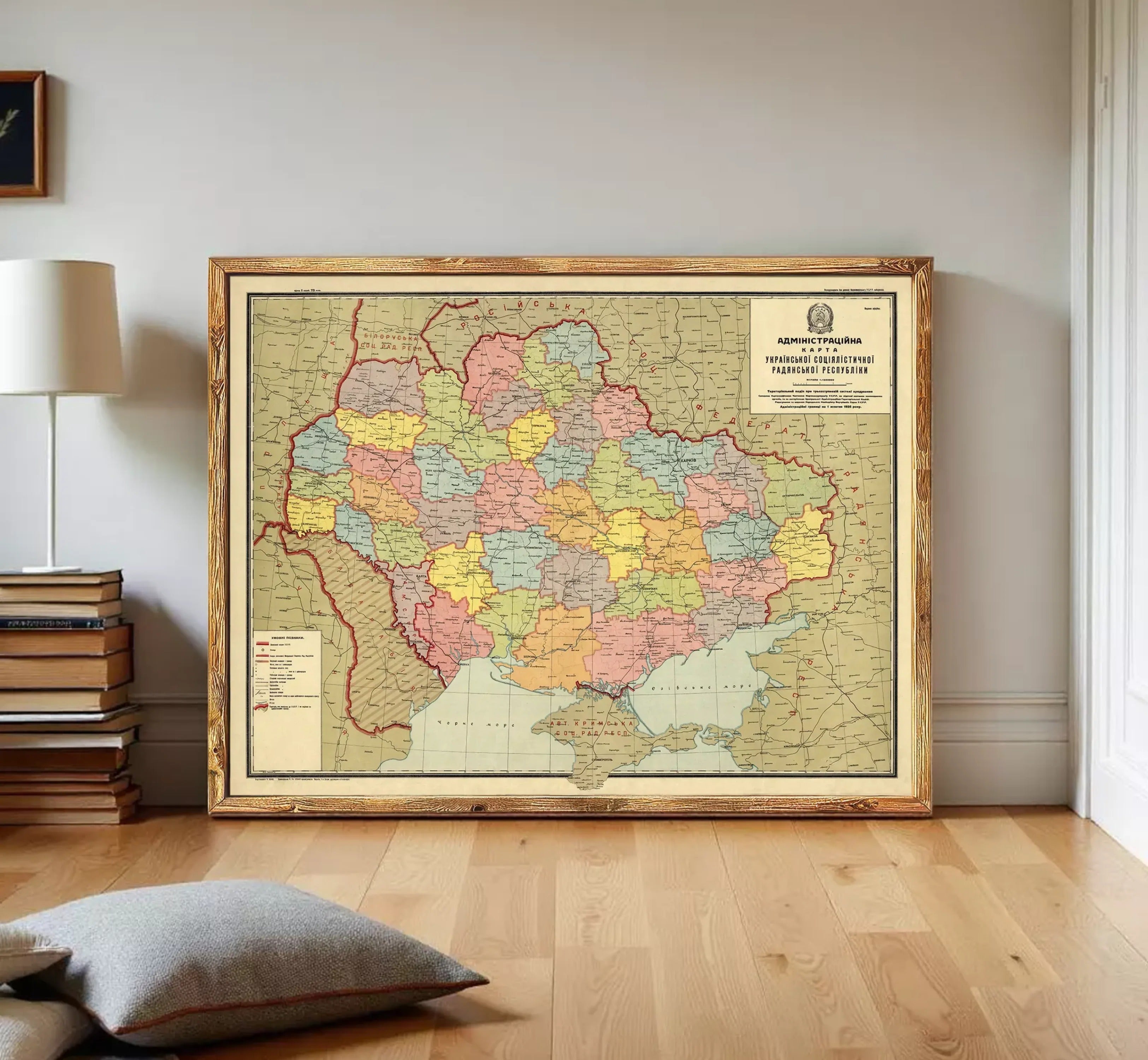 The image is a framed map of Ukraine, showing the country's various regions and administrative divisions.