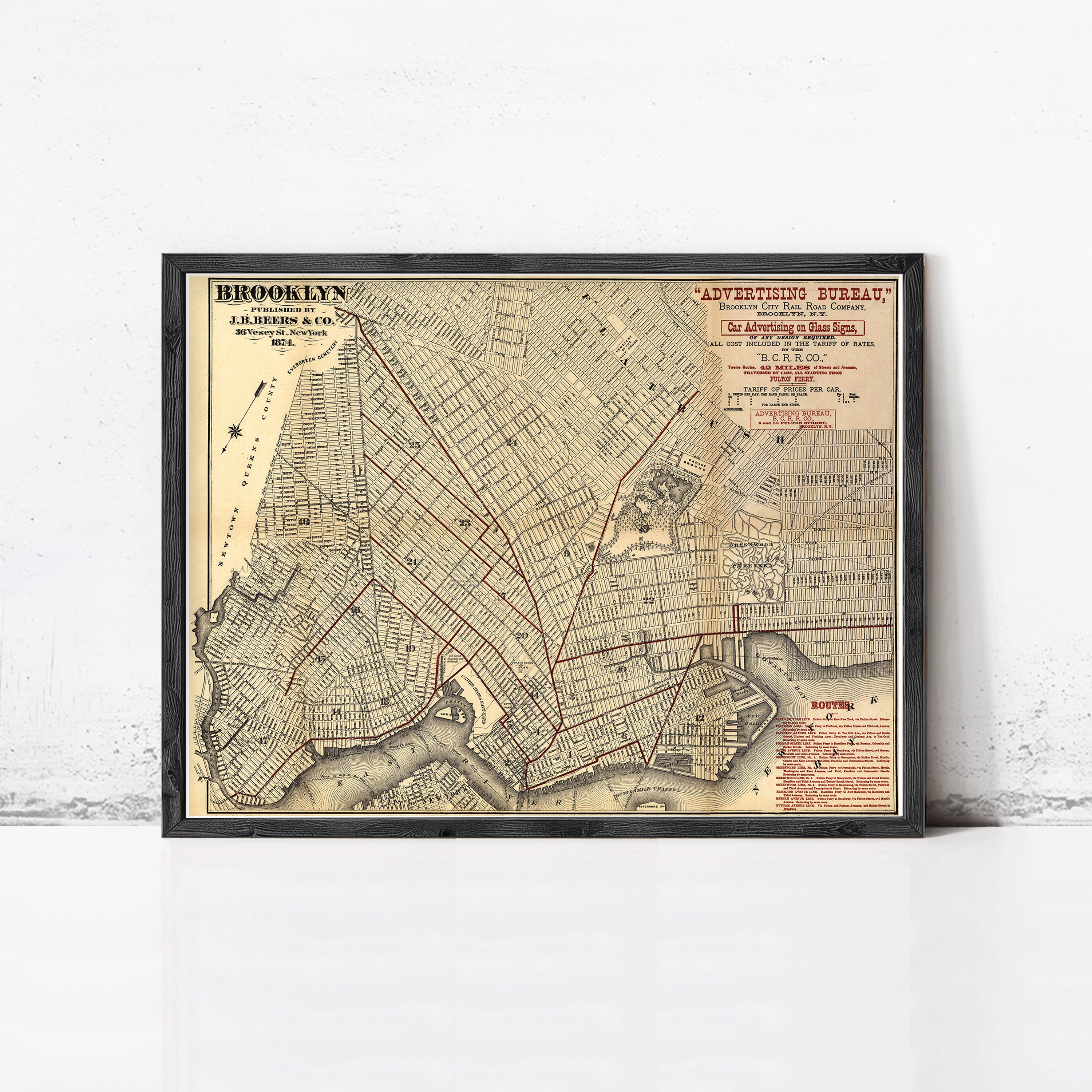 The image is a framed vintage map of Brooklyn, New York, depicting the city's streets and neighborhoods.