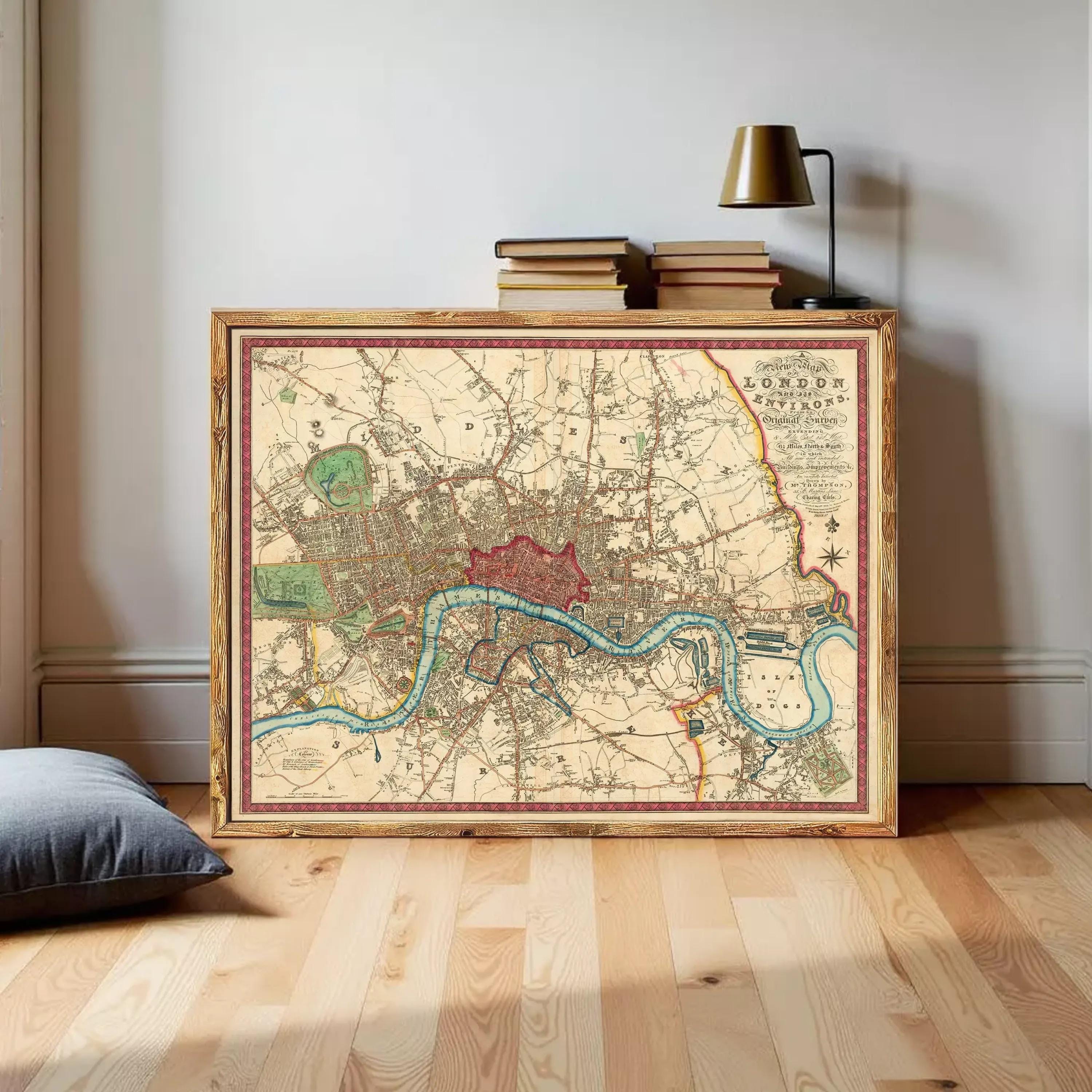 The image is a framed vintage map of London, England, depicting the city's streets, landmarks, and surrounding areas.
