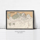 The image is a framed vintage map of Hobart, Australia, depicting the city's layout and surrounding areas.