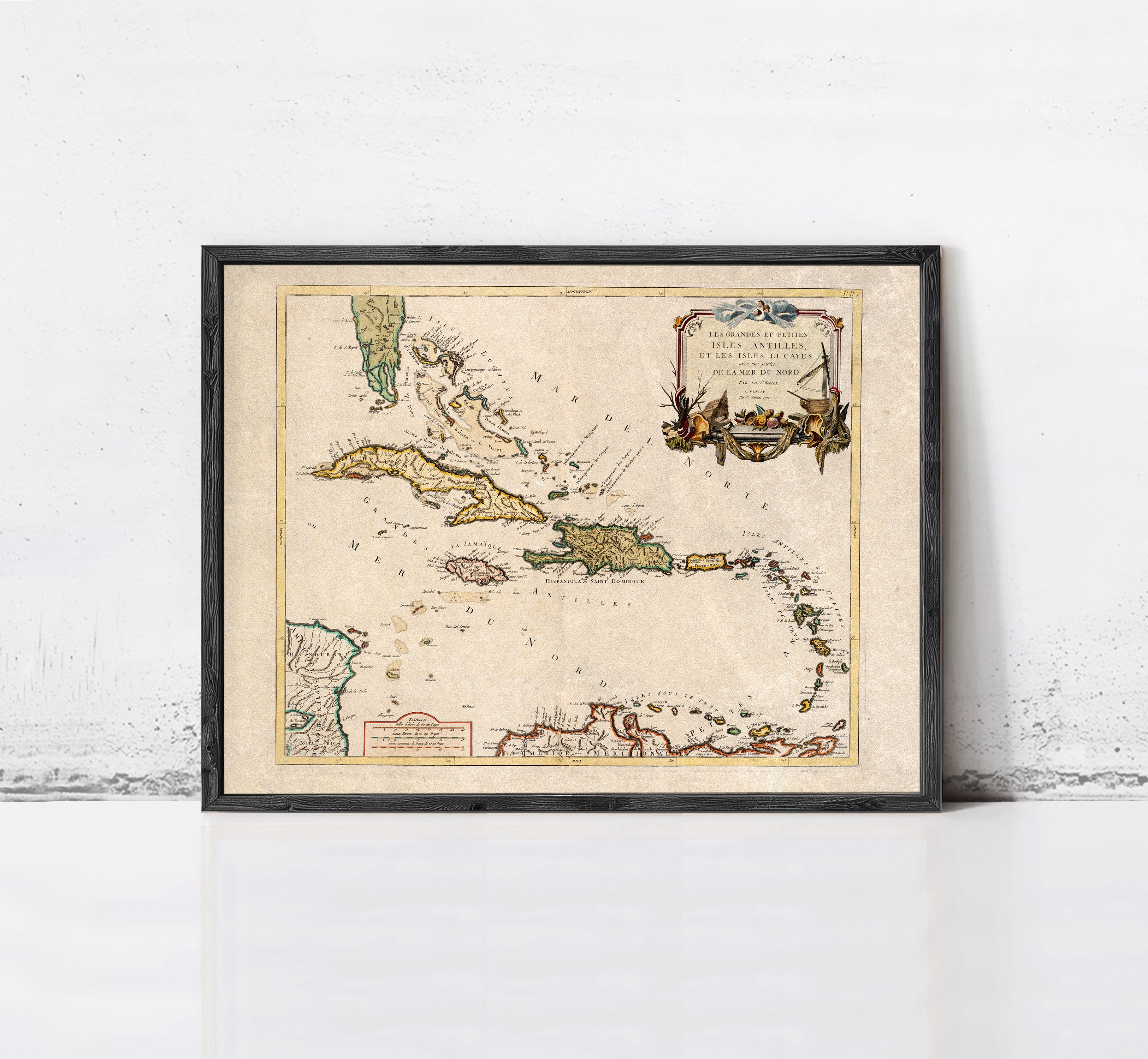 The image is a framed vintage map of the Caribbean region, depicting various islands and coastlines.