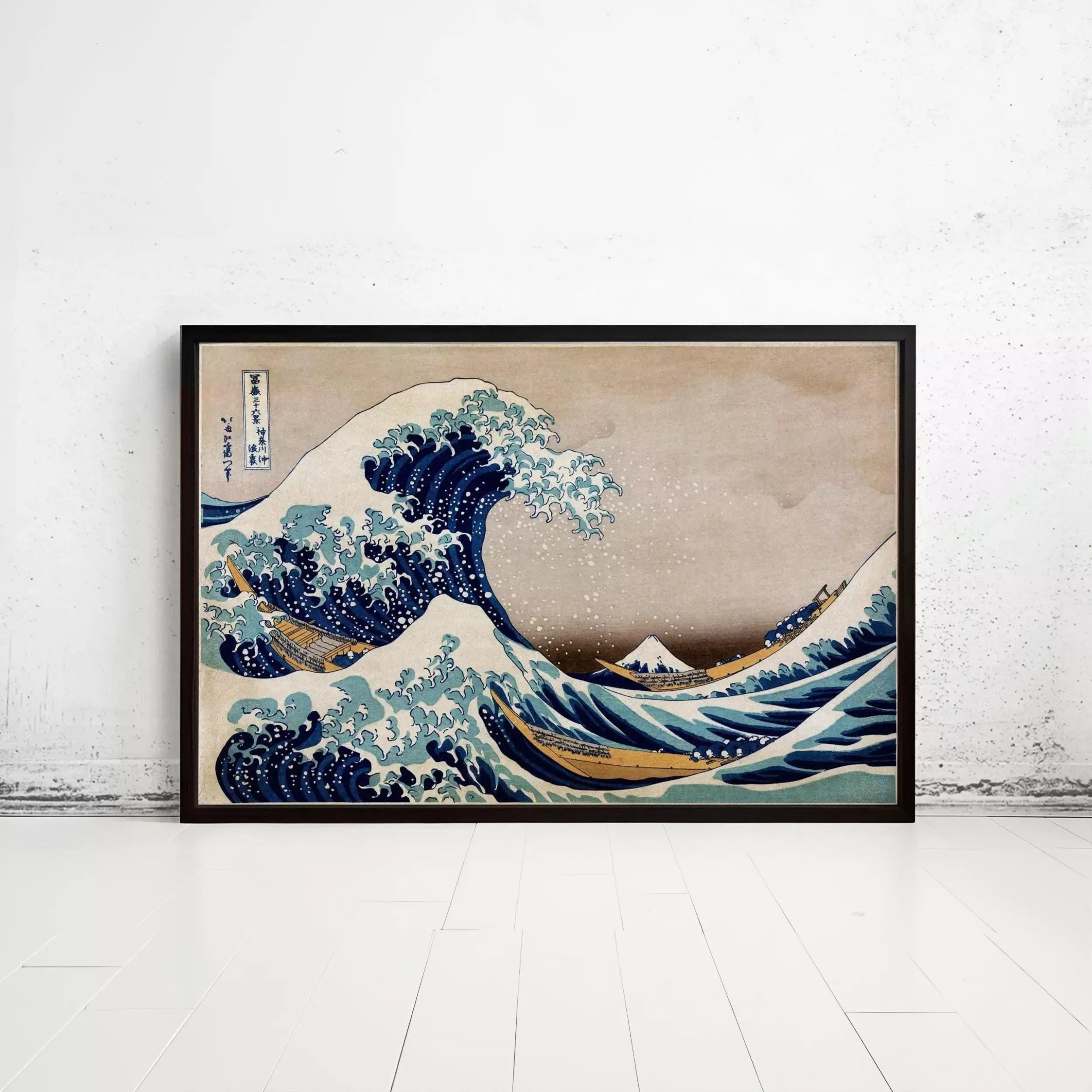 The image is a framed print of the famous Japanese woodblock print "The Great Wave off Kanagawa" by the artist Hokusai. The print depicts a large, powerful wave crashing against the shore, showcasing the artist's skill and mastery of the art form.