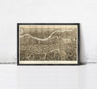 The image is a framed print of a detailed map of London, England, depicting the city's streets, landmarks, and waterways.