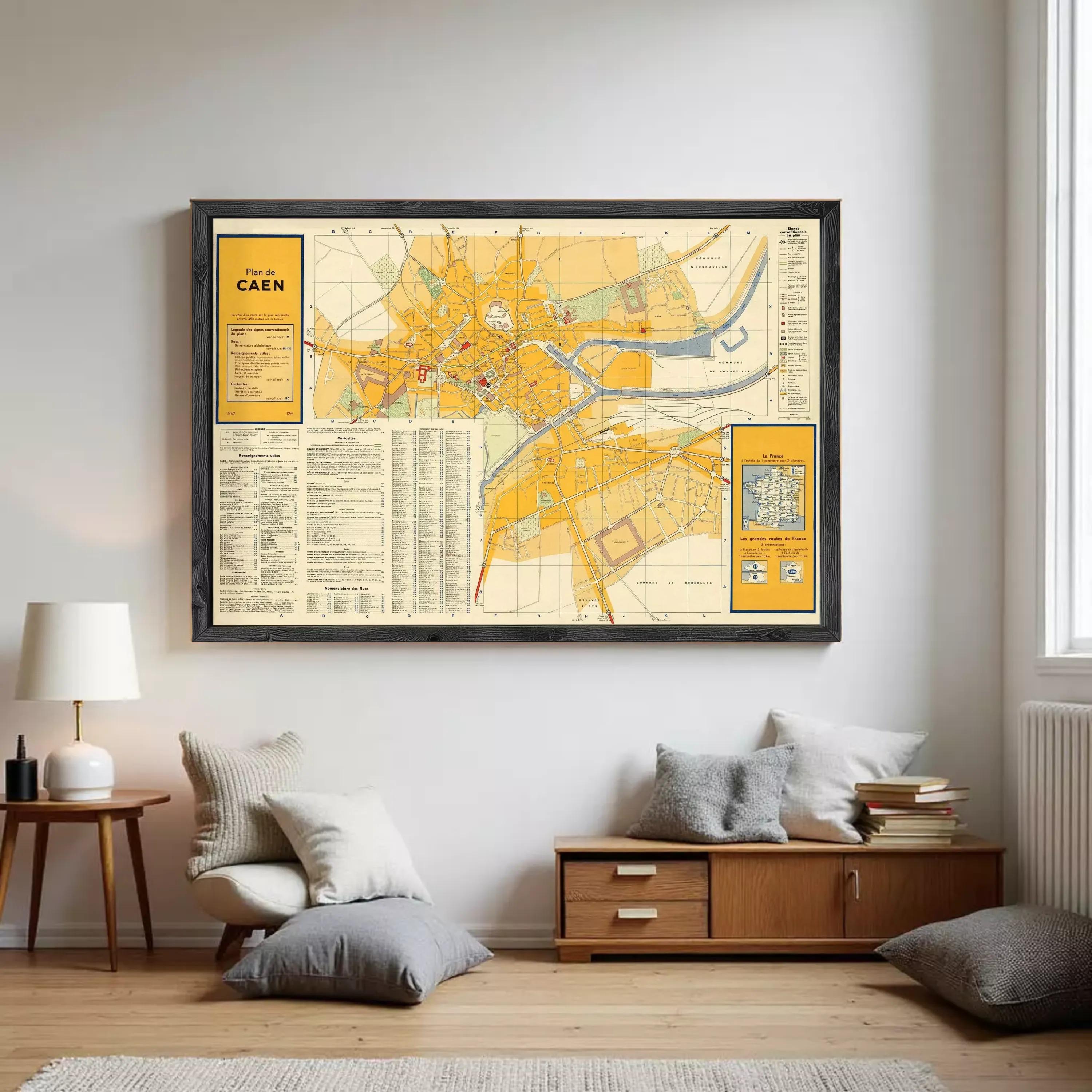 The image is a framed map of Caen, France, showing various landmarks and locations within the city.