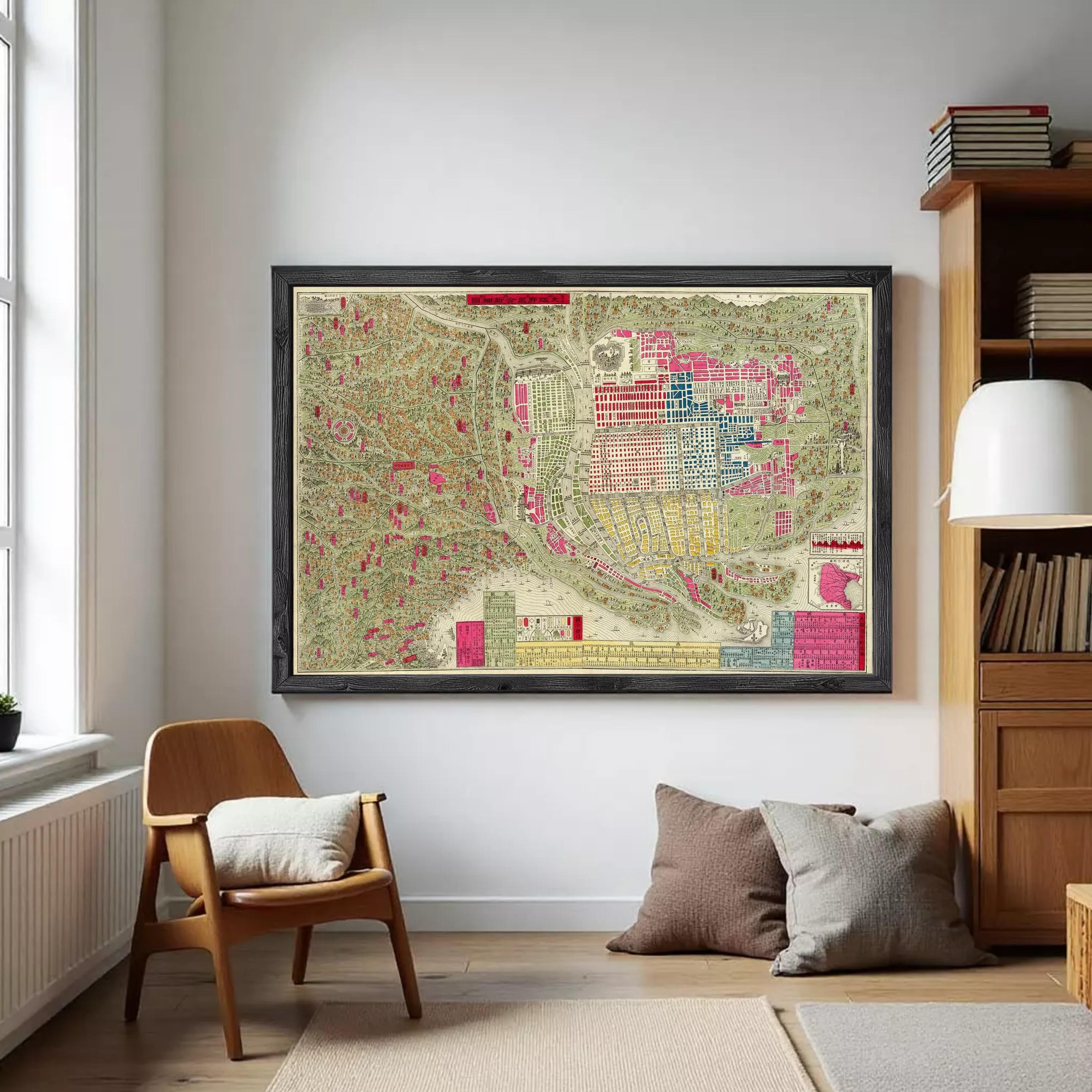 The image is a framed vintage map of a city, depicting various landmarks and streets in a colorful and detailed manner.