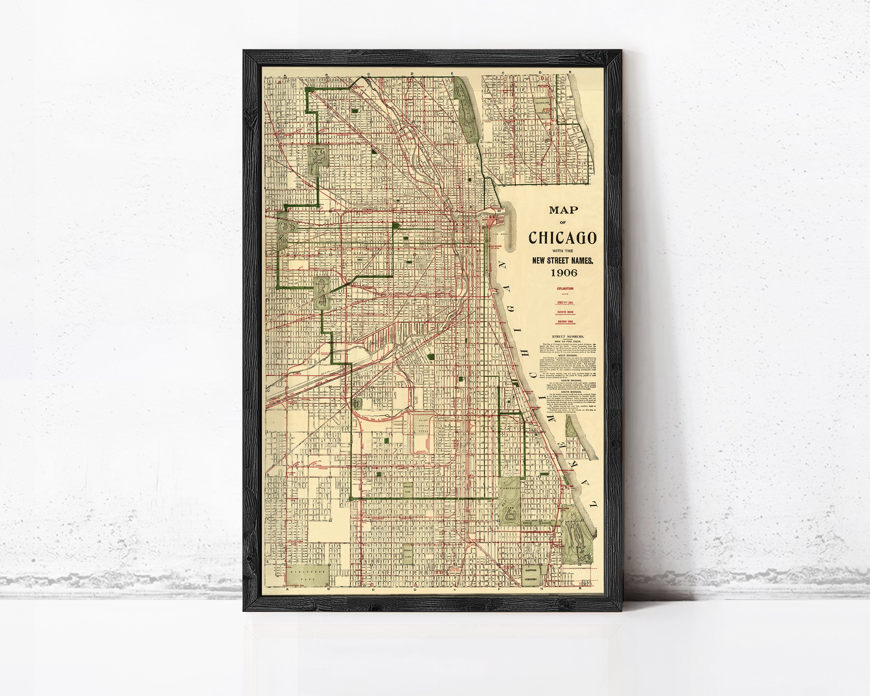 The image is a framed vintage map of Chicago, Illinois, depicting the city's streets and transportation system.