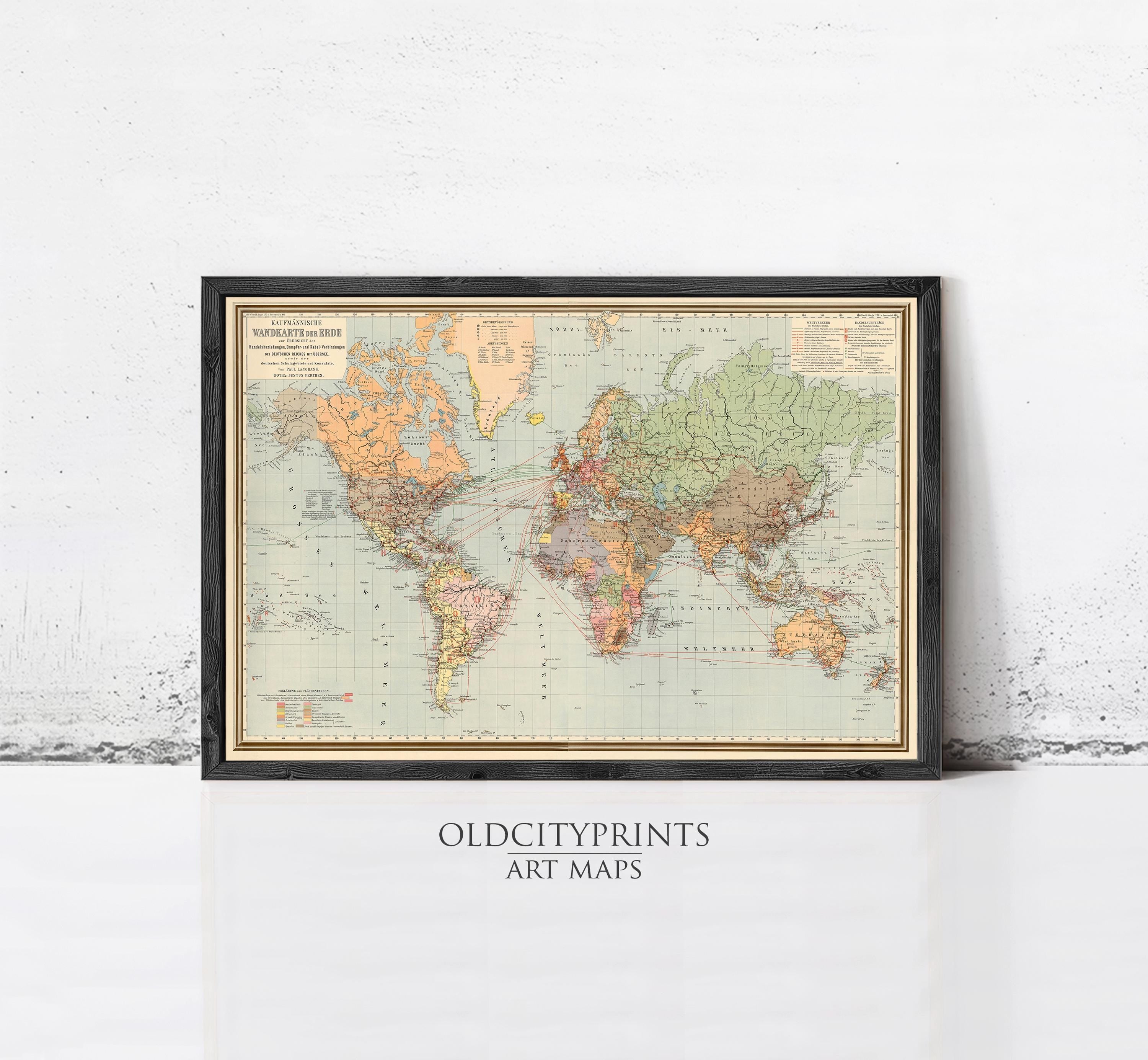 The image is a framed vintage world map from Old Cityprints, an art map company, displayed on a white wall.
