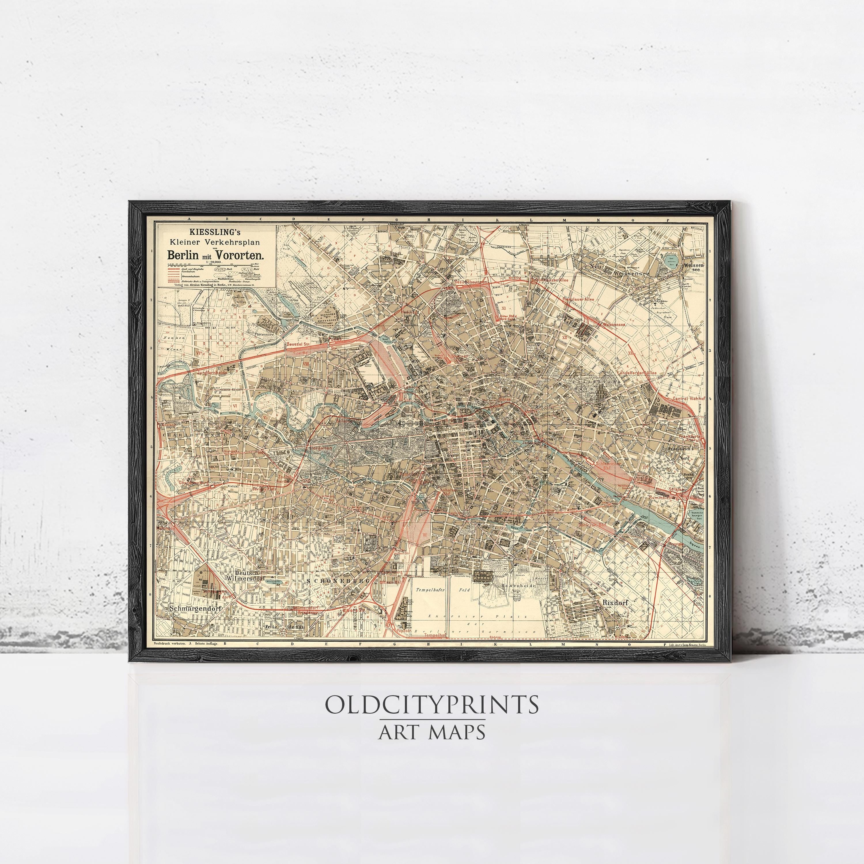 The image is a framed vintage map of Berlin, Germany, depicting the city's streets and landmarks.