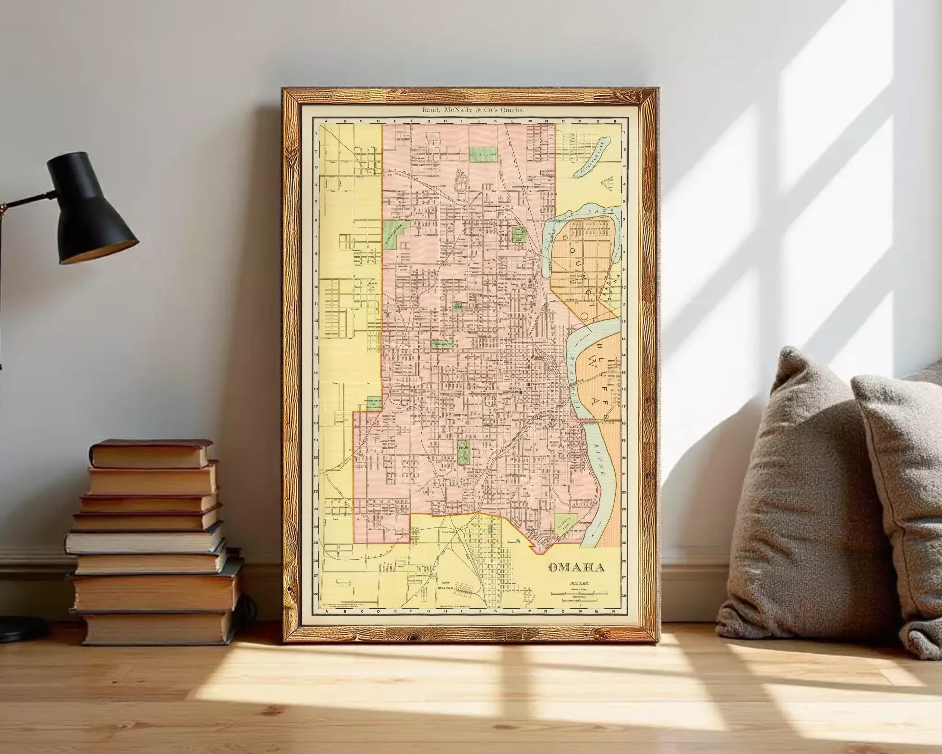 The image is a framed vintage map of Omaha, Nebraska, showing the city's layout and surrounding areas.