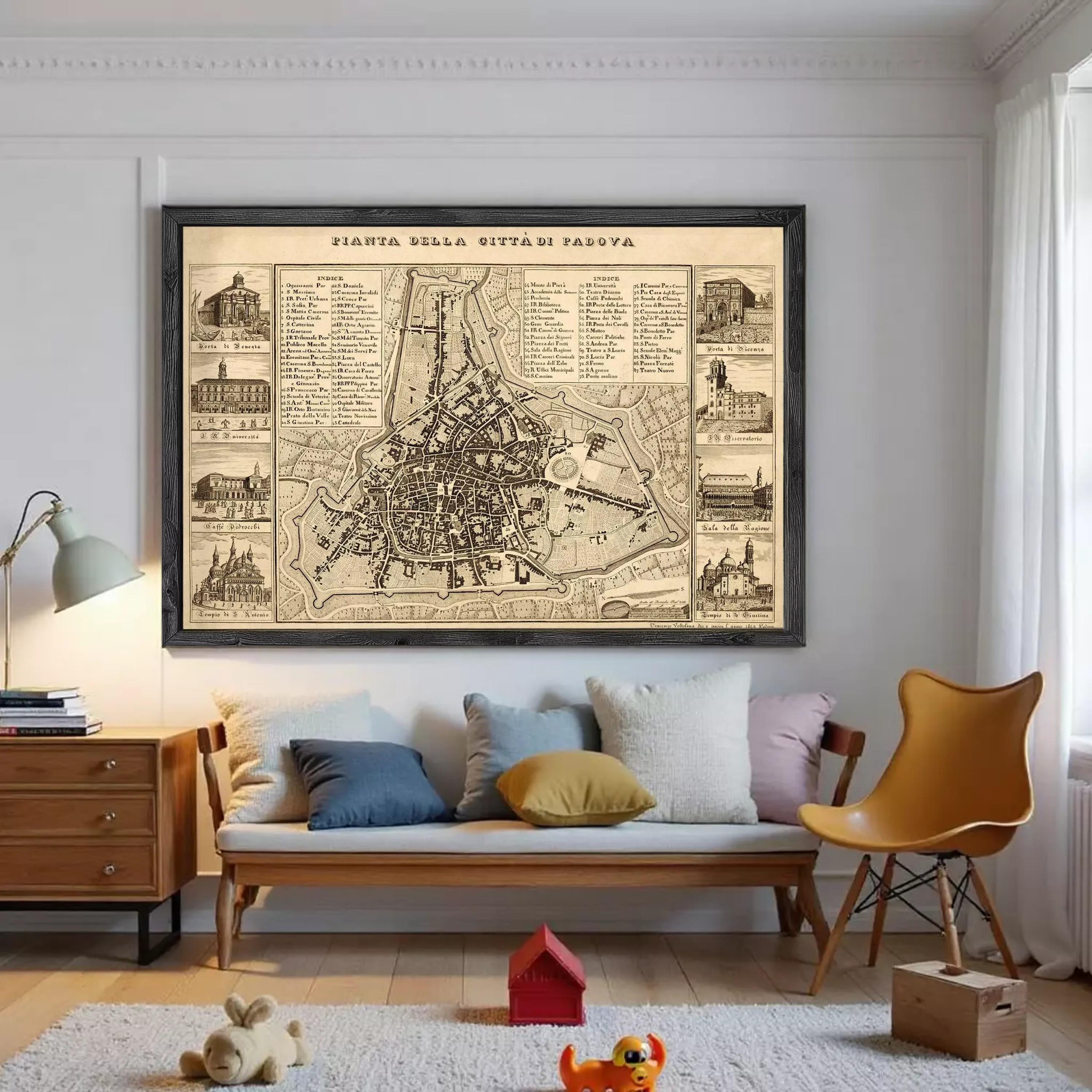 a large framed map of a city hanging on a wall in a living room.