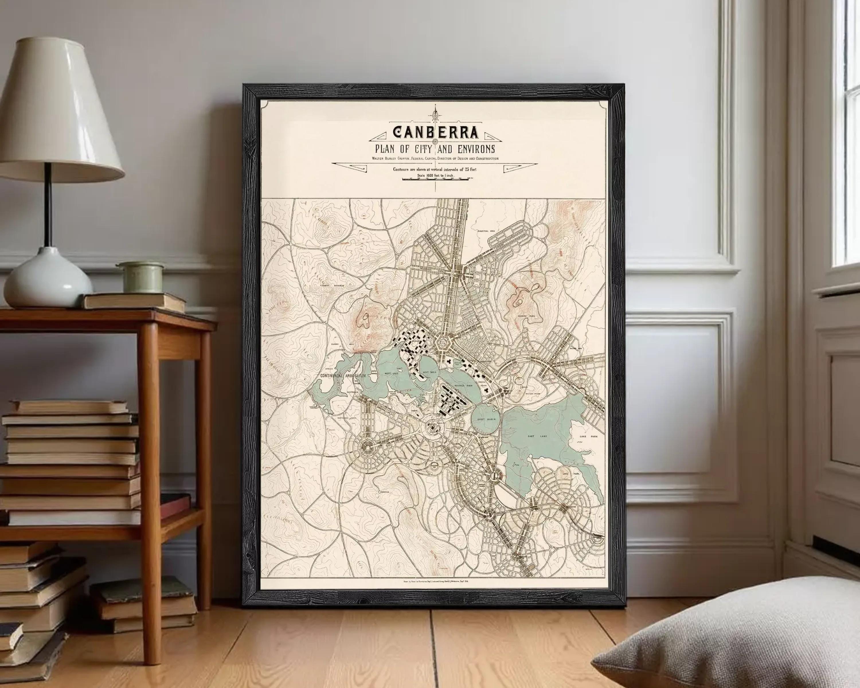 The image is a framed map of the city of canberra, Australia, depicting the city's layout and surrounding areas.