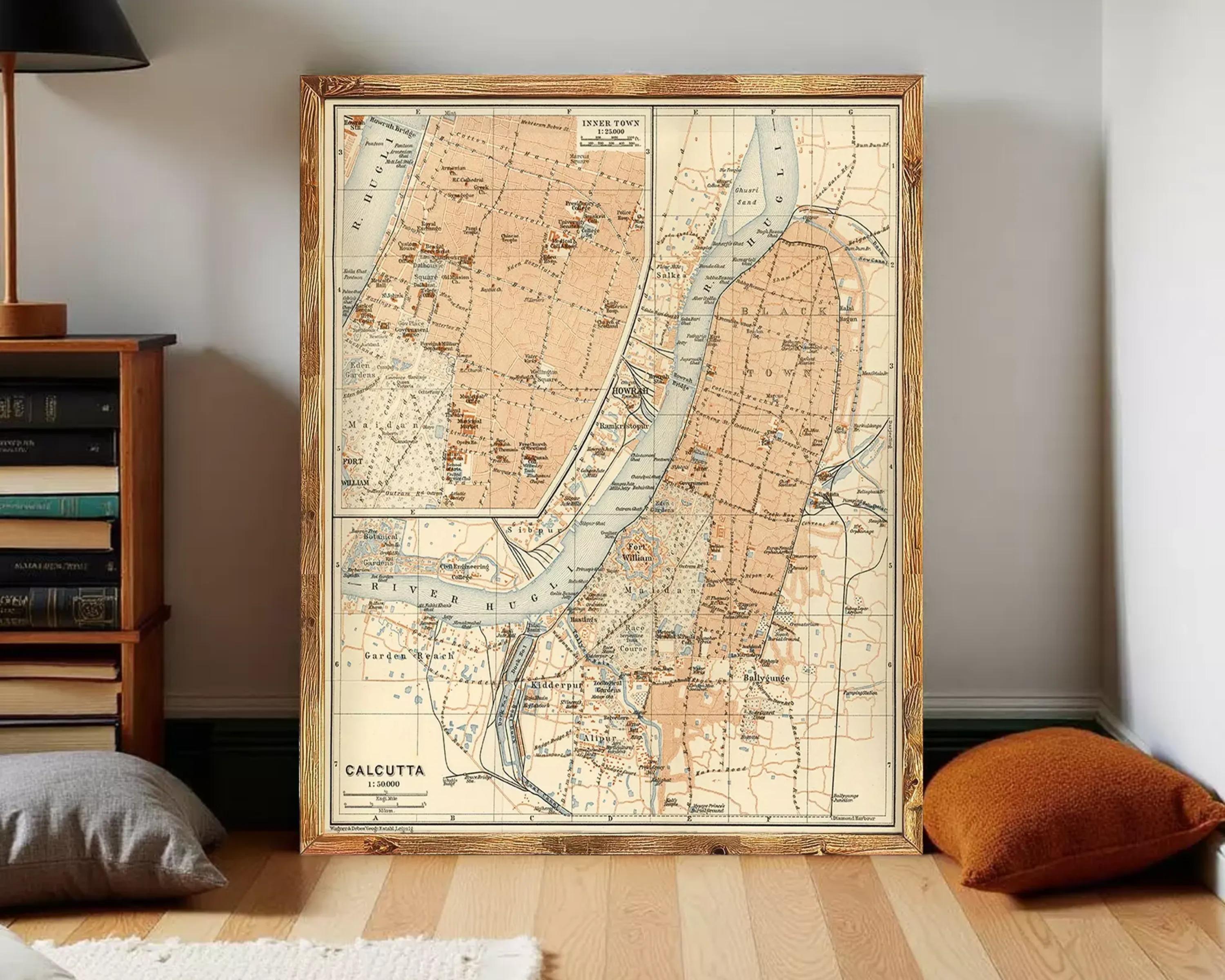 The image is a framed vintage map of Calcutta, India, depicting various landmarks and geographical features.