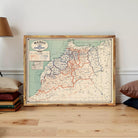 a framed map of Morocco, which is a vintage map of the country.